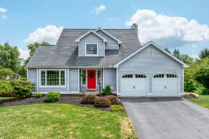 Large beautiful home with two car garage and red door